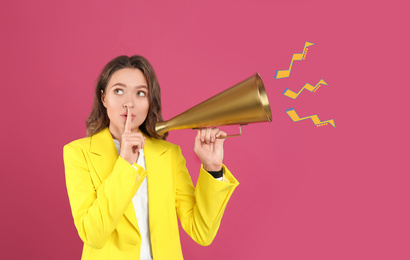 Image of Young woman with megaphone on pink background