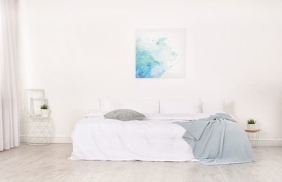Photo of Stylish room interior with comfortable double bed