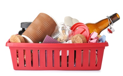 Photo of Crate with different garbage on white background. Trash recycling