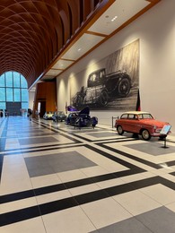 Photo of Hague, Netherlands - November 8, 2022: View of many different retro cars in Louwman museum