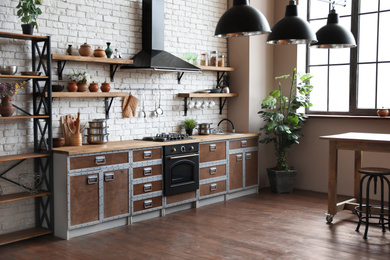 Photo of Beautiful kitchen interior with new stylish furniture