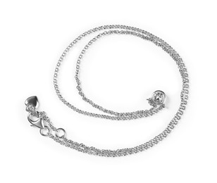 Photo of Elegant silver necklace with gemstone isolated on white, top view. Luxury jewelry