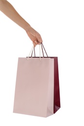 Photo of Woman with paper shopping bags on white background, closeup