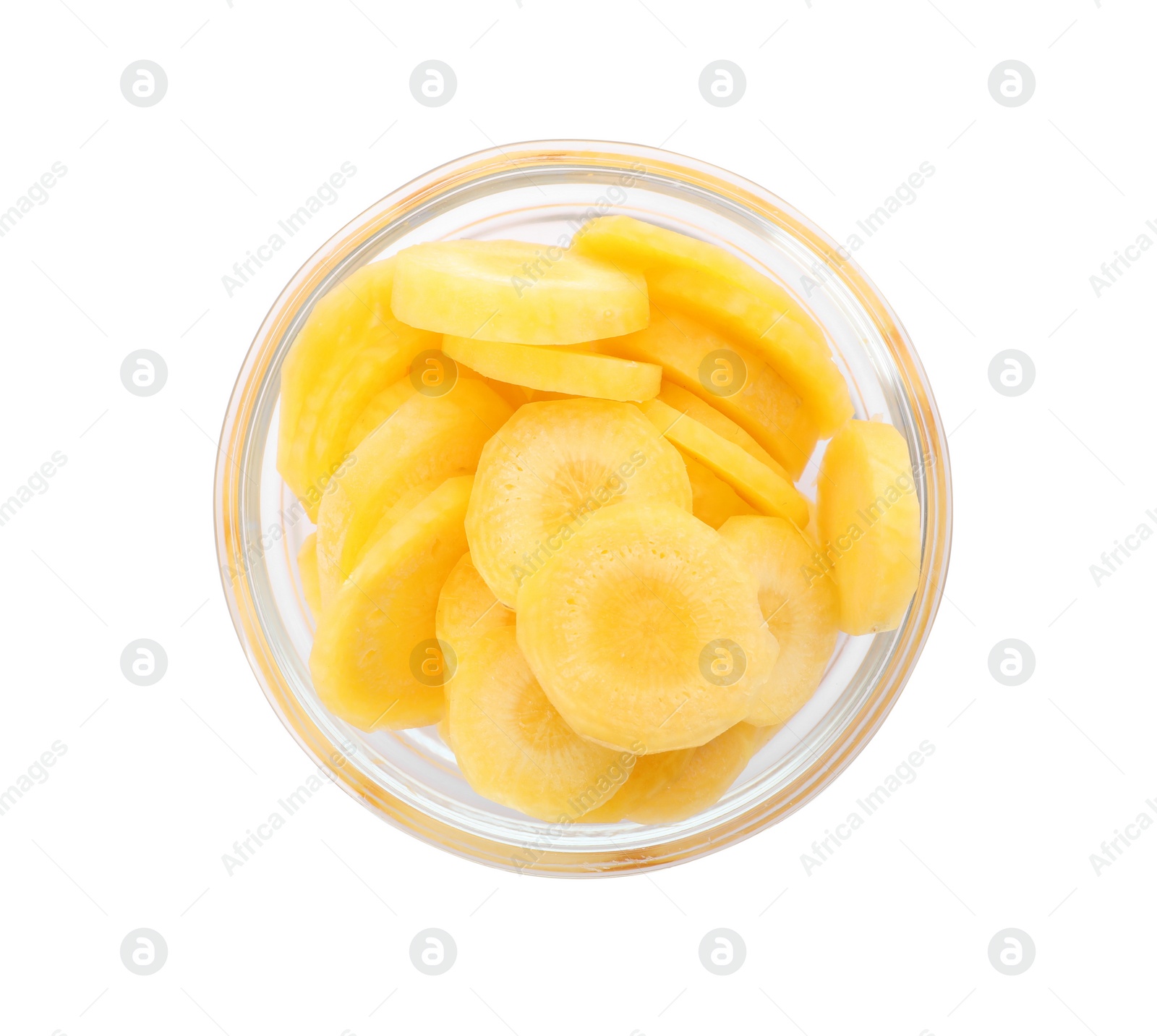 Photo of Slices of raw yellow carrot in glass bowl isolated on white, top view
