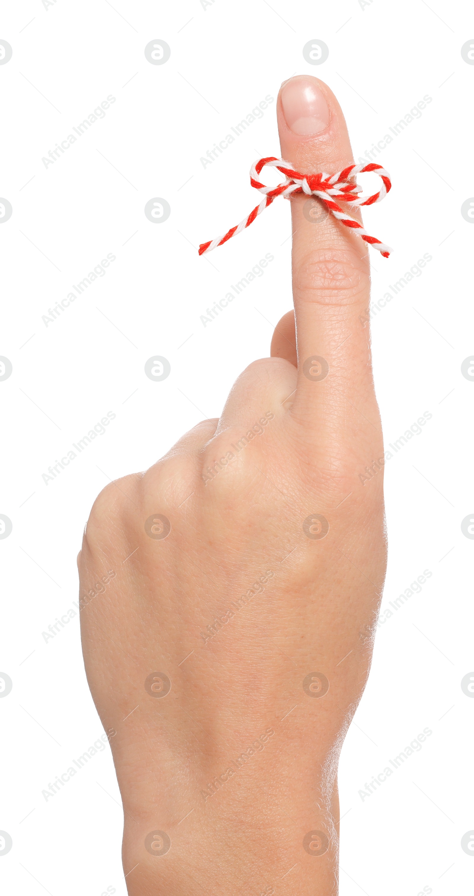 Photo of Woman showing index finger with tied bow as reminder on white background, closeup