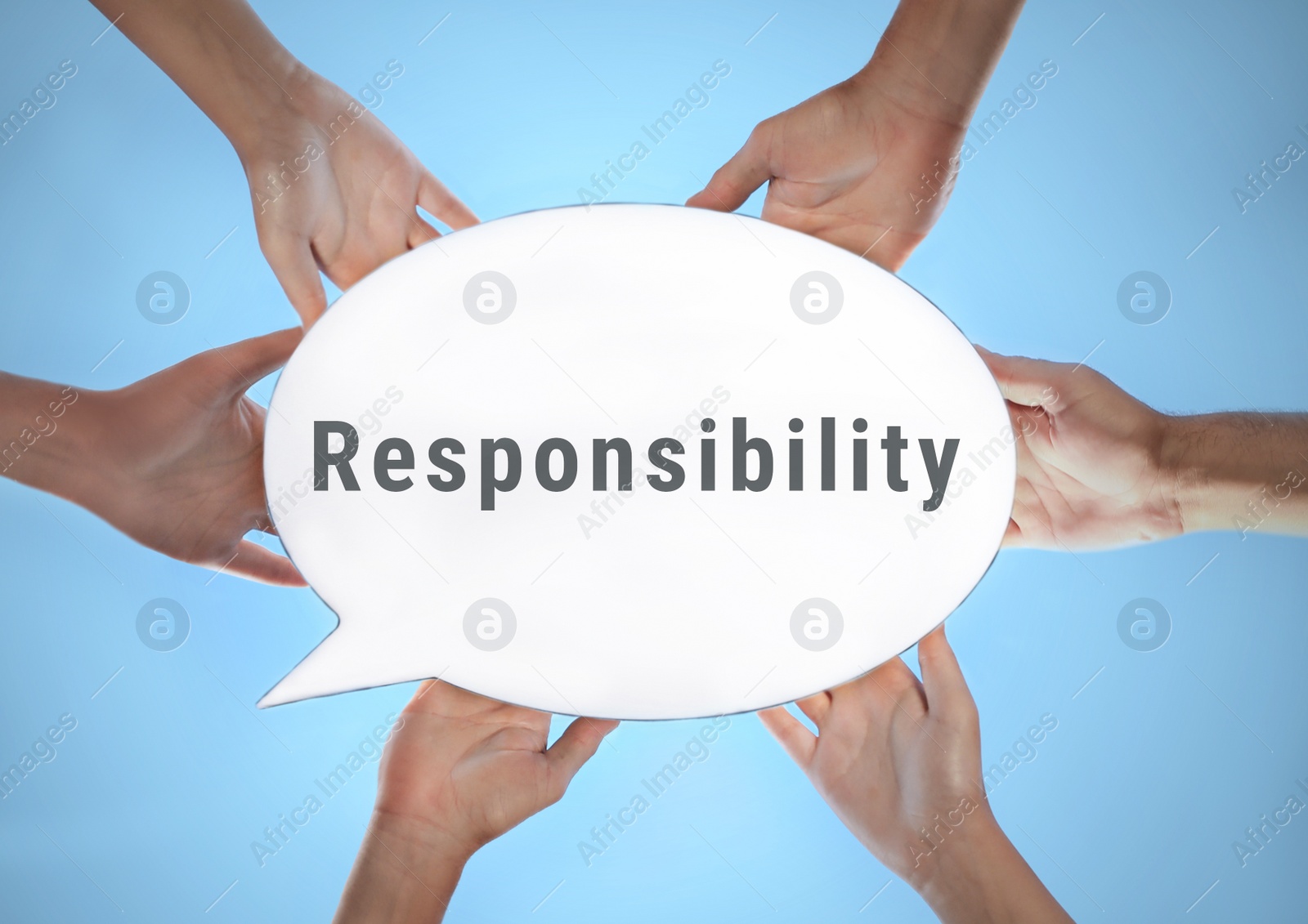 Image of Social responsibility concept. Group of people holding speech bubble lightbox on light blue background, closeup