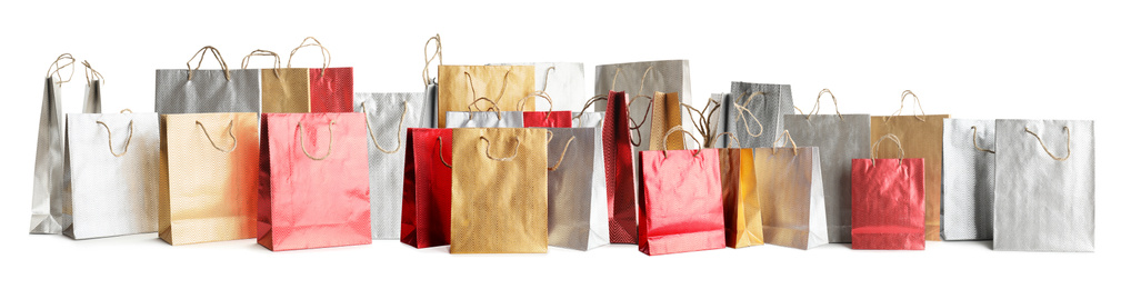 Image of Set of paper shopping bags on white background. Banner design