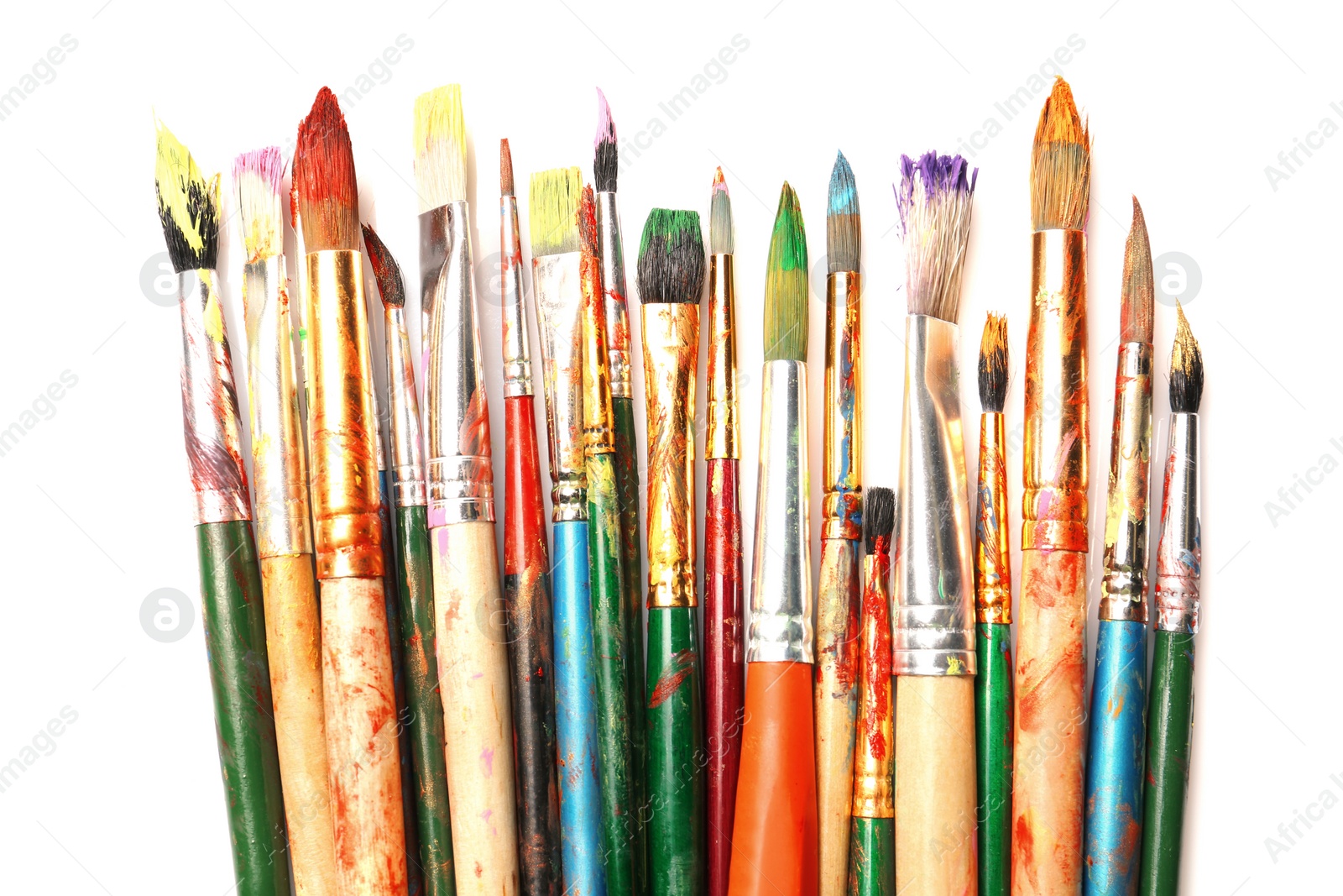 Photo of Different paint brushes on white background, top view