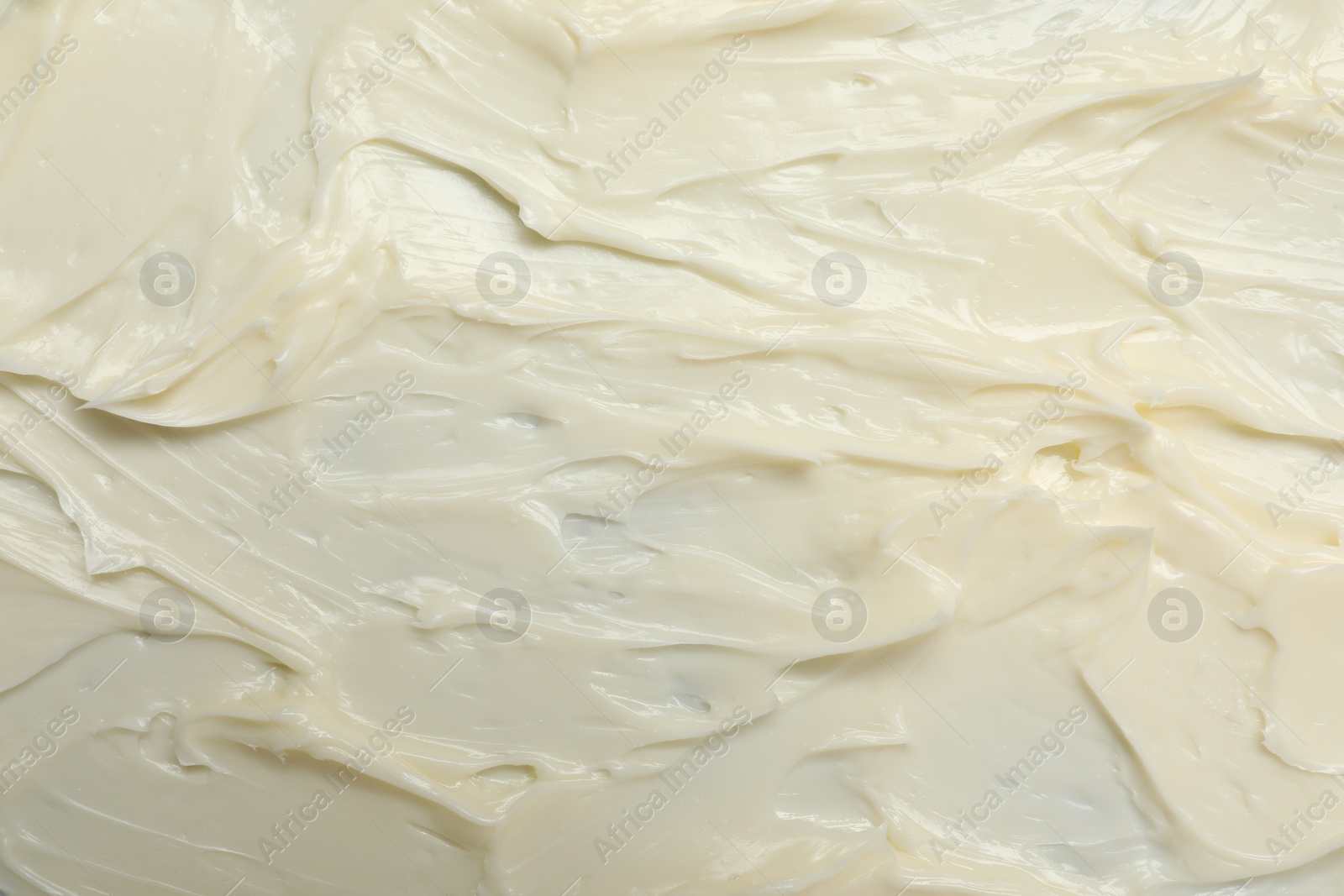 Photo of Texture of tasty butter as background, top view