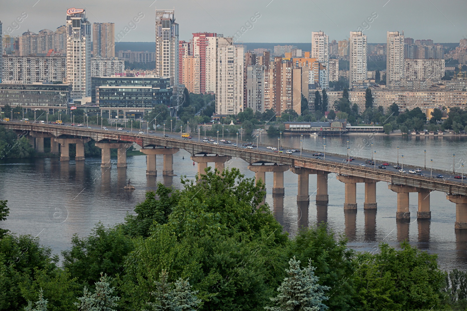 Photo of KYIV, UKRAINE - MAY 23, 2019: Beautiful view of Paton bridge over Dnipro river