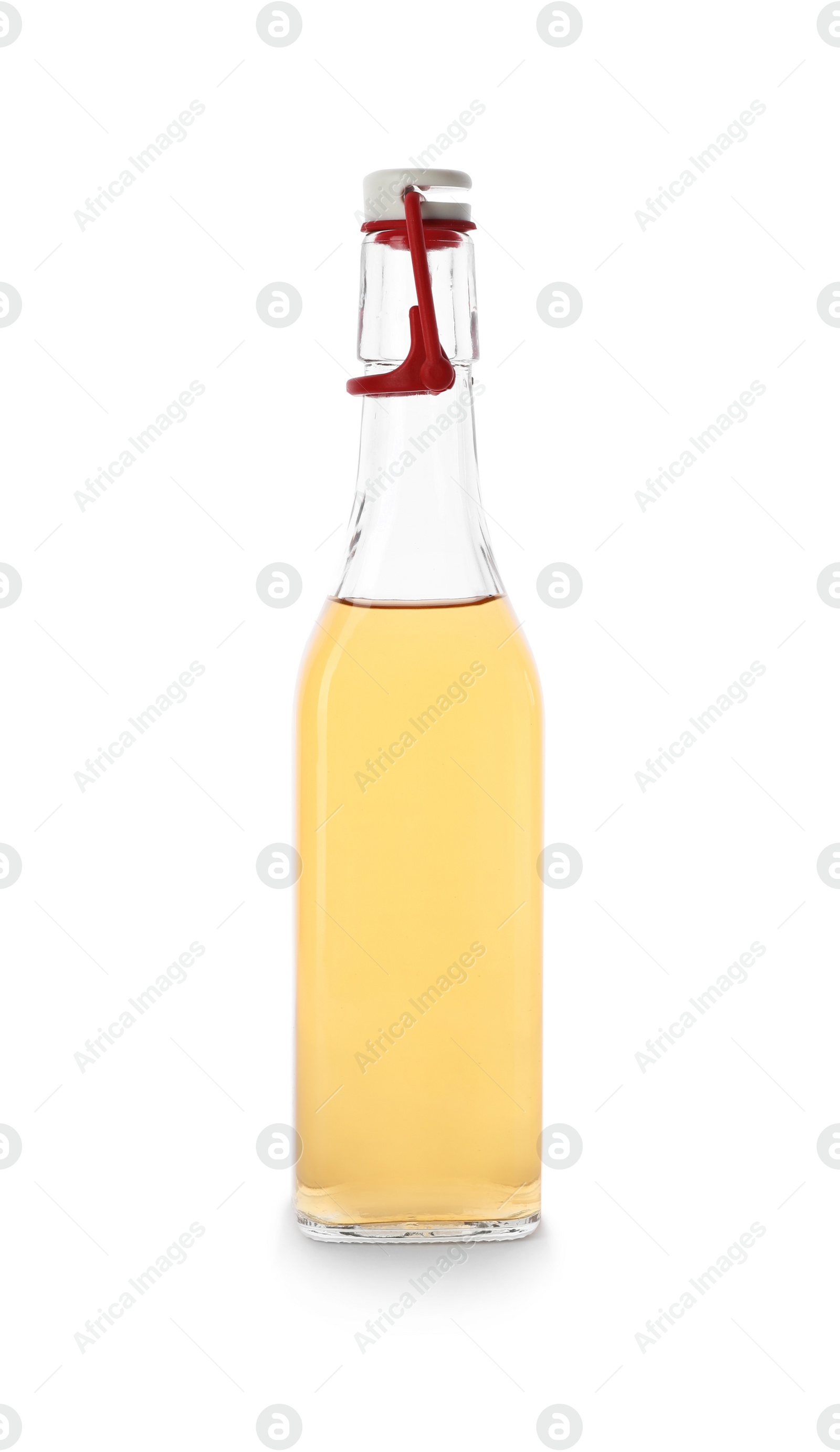 Photo of Glass bottle of apple vinegar on white background