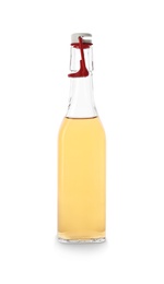 Photo of Glass bottle of apple vinegar on white background