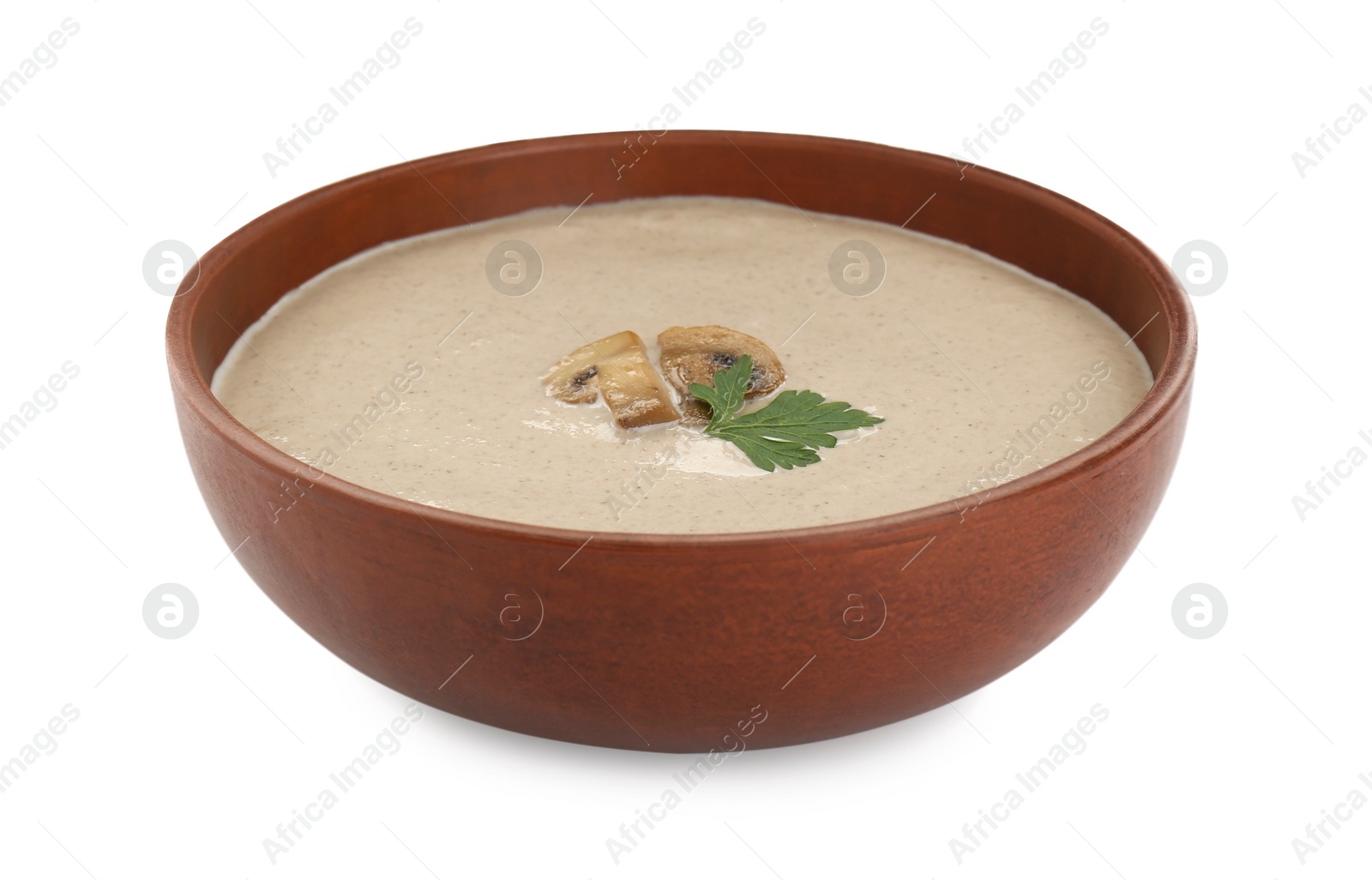 Photo of Delicious mushroom cream soup with parsley isolated on white