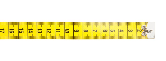 Photo of New yellow measuring tape isolated on white, top view