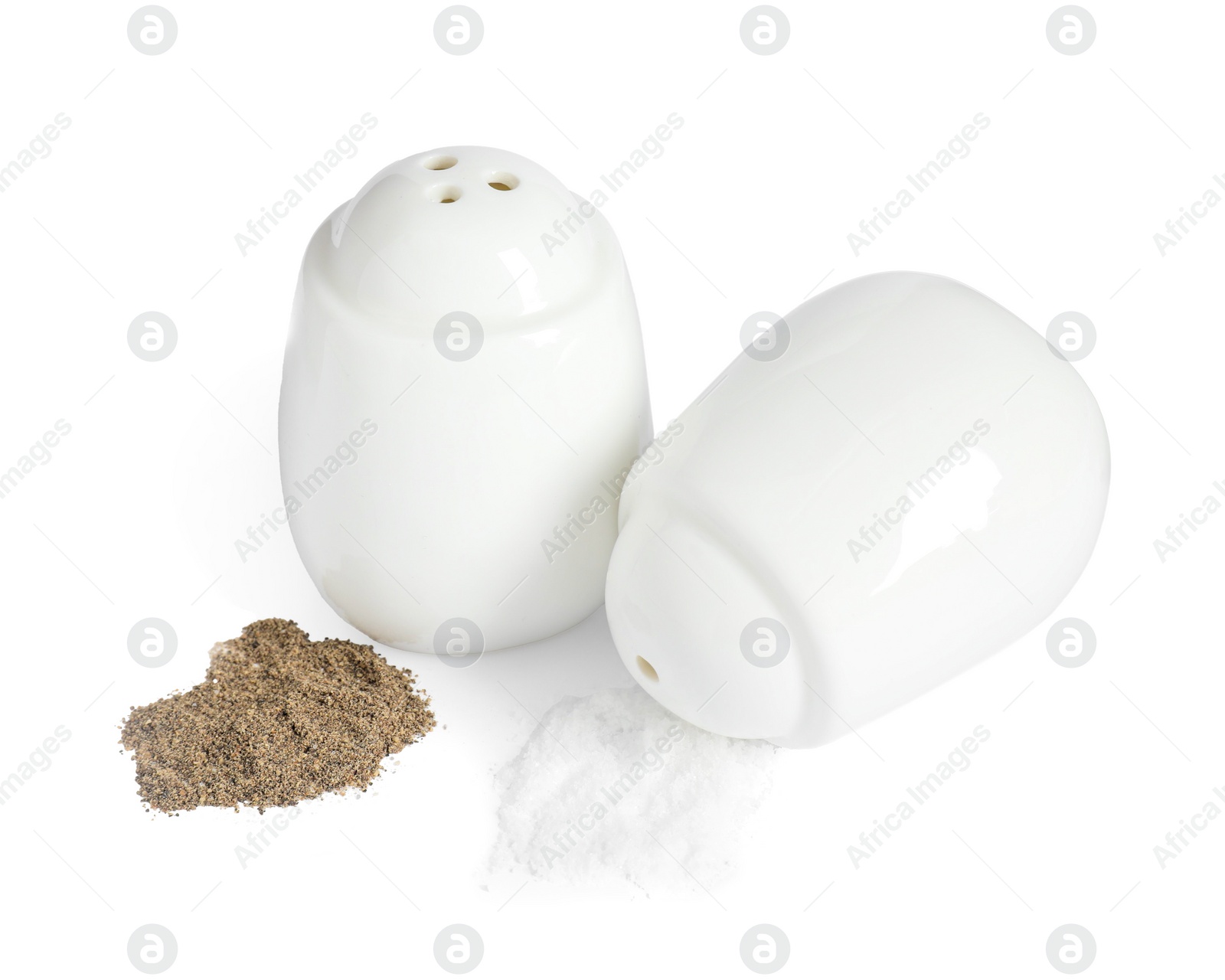 Photo of Two shakers with pepper and salt isolated on white