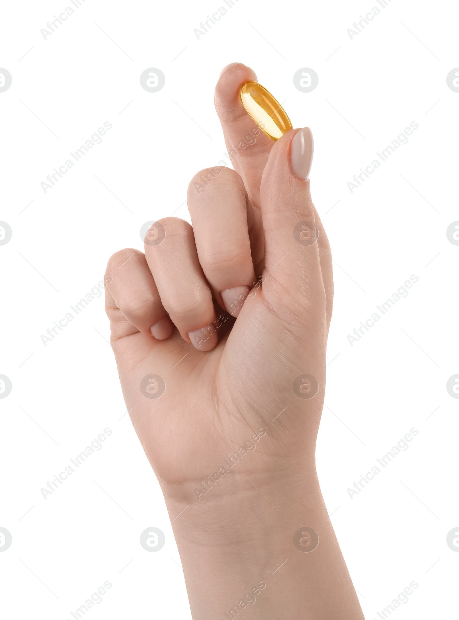 Photo of Woman holding vitamin capsule on white background, closeup. Health supplement