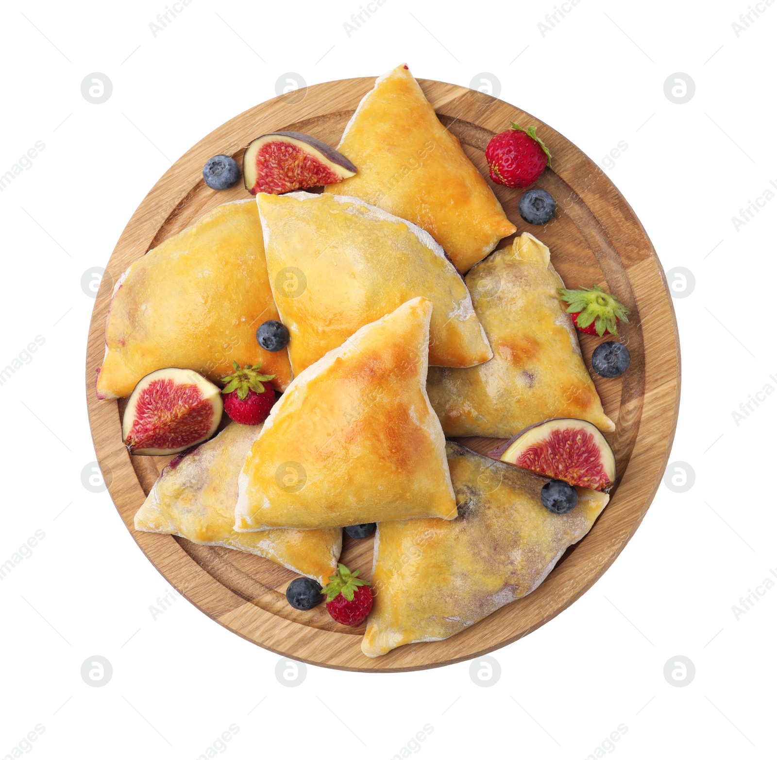 Photo of Delicious samosas with figs and berries isolated on white, top view