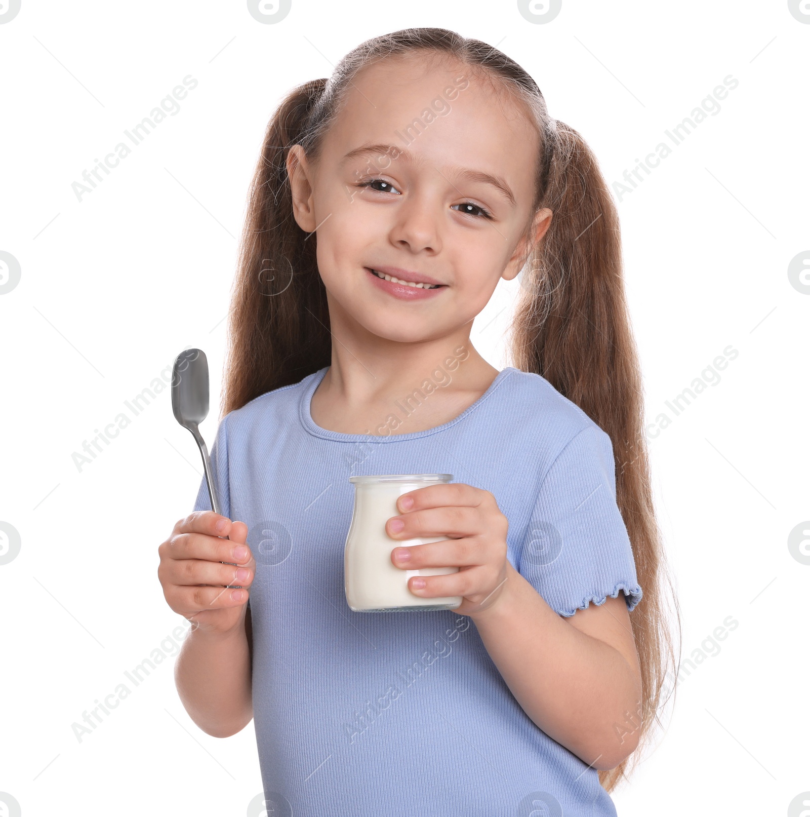 Photo of Cute little girl with tasty yogurt on white background