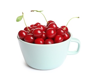 Photo of Cup of delicious ripe sweet cherries on white background