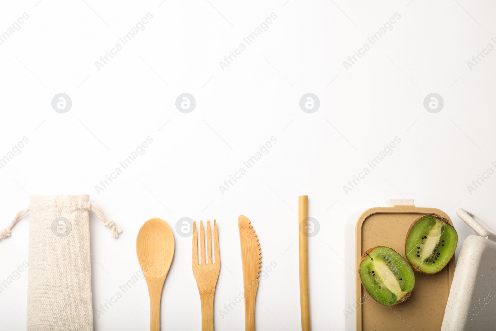 Photo of Flat lay composition with eco friendly products on white background, space for text