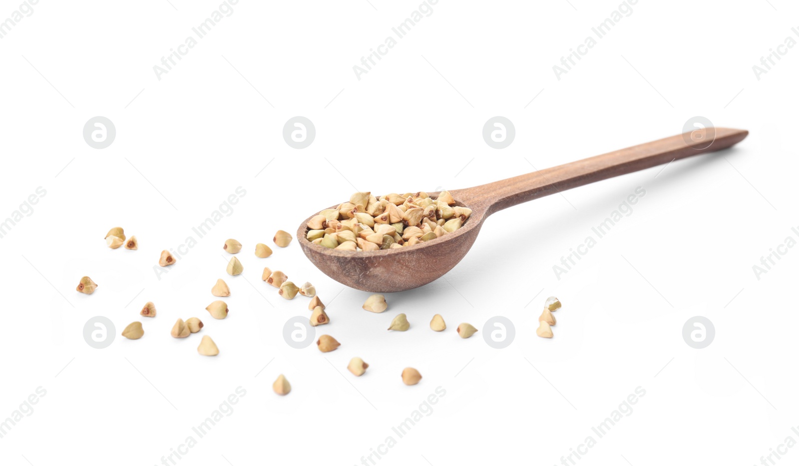 Photo of Uncooked green buckwheat grains in spoon isolated on white