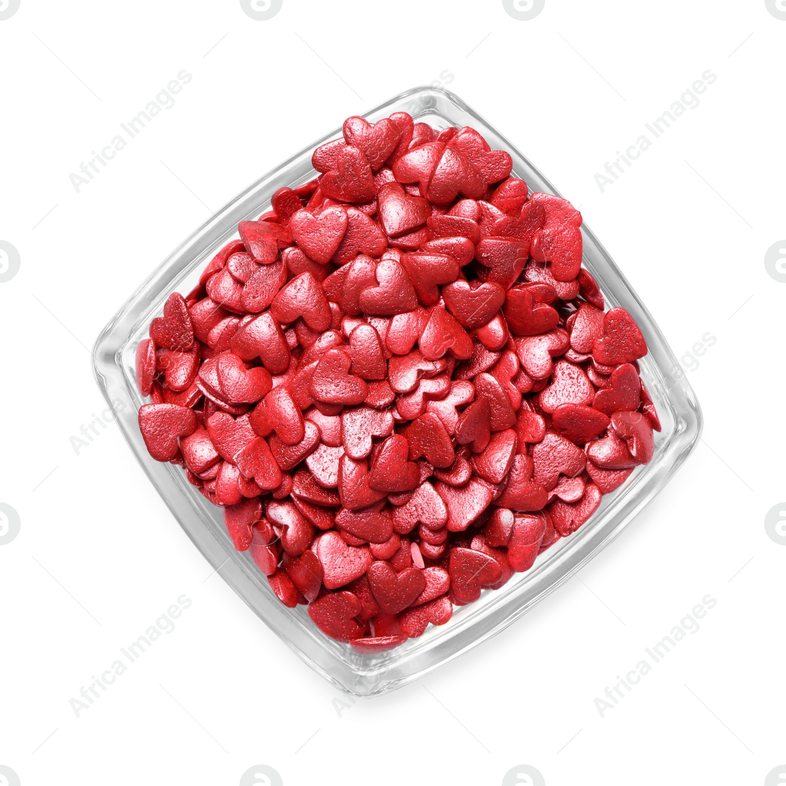 Photo of Sweet candy hearts in bowl on white background, top view