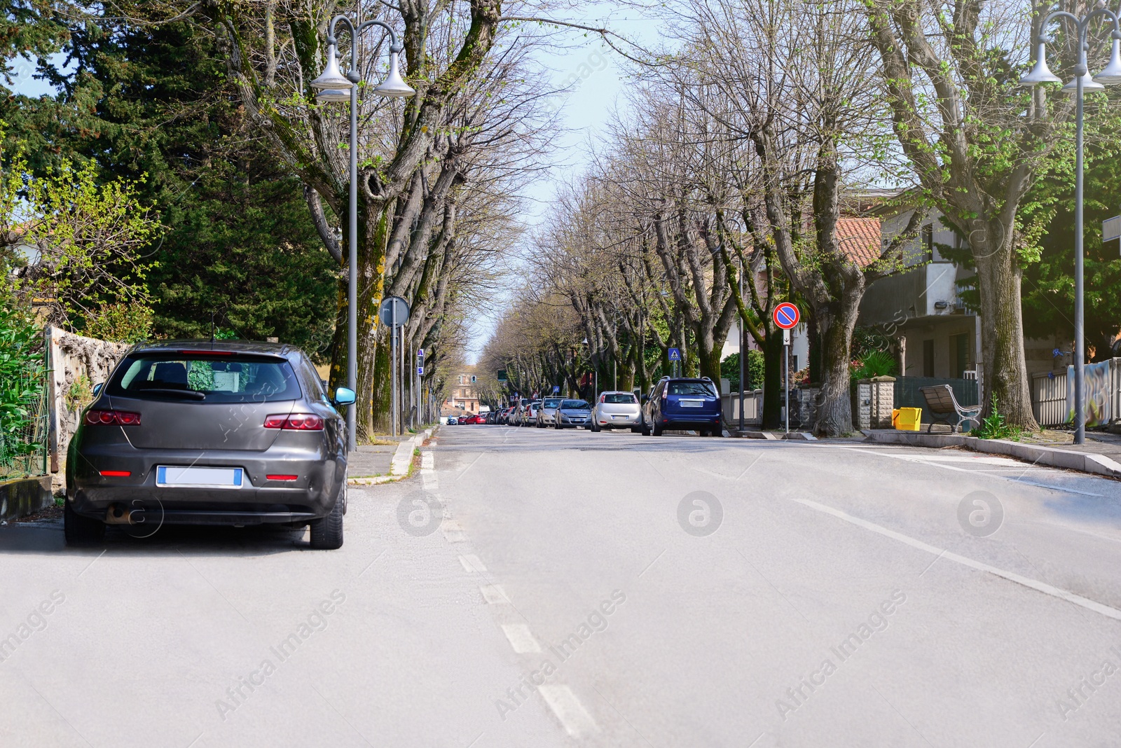 Photo of Beautiful view of city street traffic with cars on sunny day