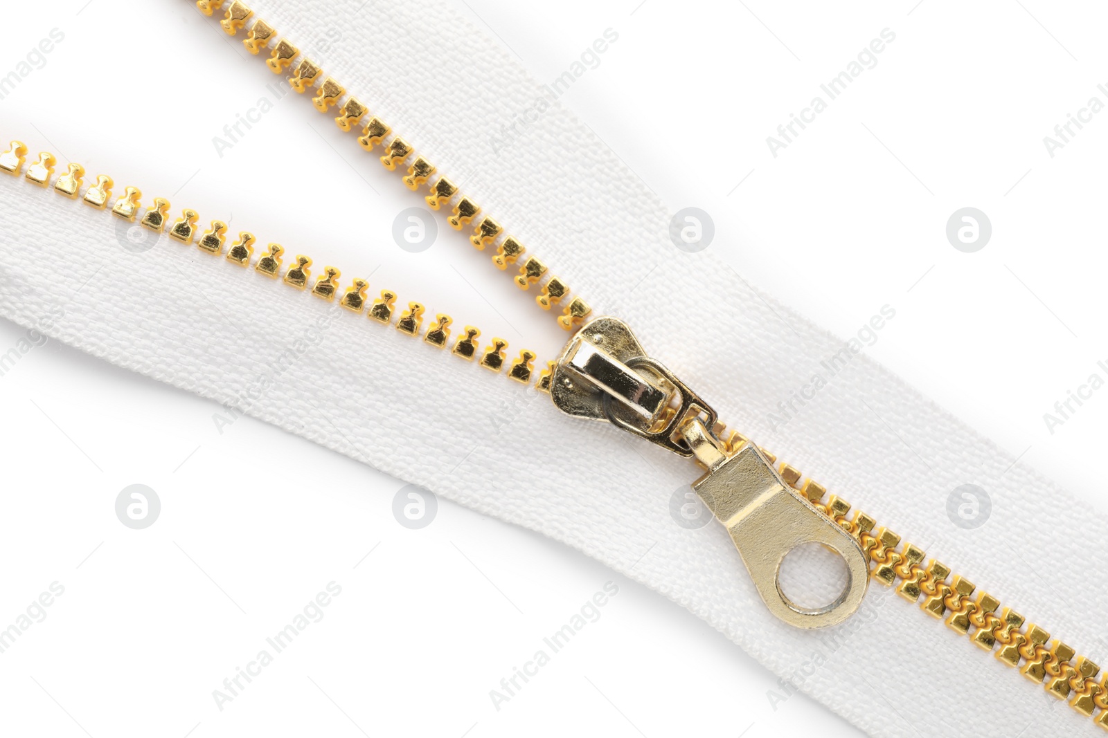 Photo of Golden zipper on white background, top view