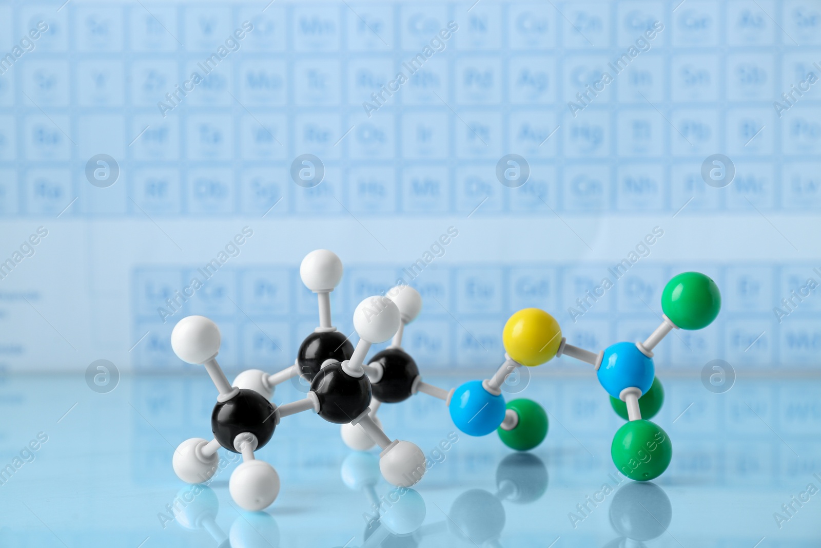 Photo of Molecular model on light surface against blurred background