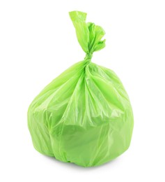 Photo of Green plastic garbage bag isolated on white