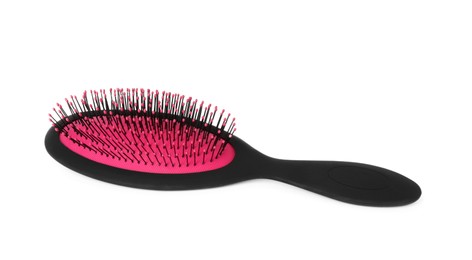 Photo of One new plastic hairbrush isolated on white