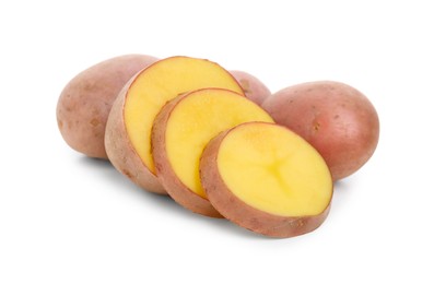 Whole and cut fresh potatoes on white background