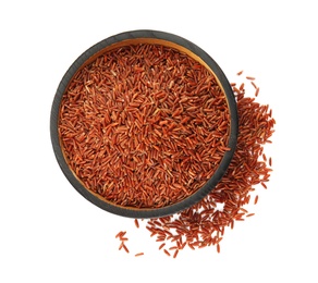 Plate with uncooked red rice on white background, top view