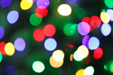 Photo of Abstract background with blurred colorful Christmas lights, bokeh effect