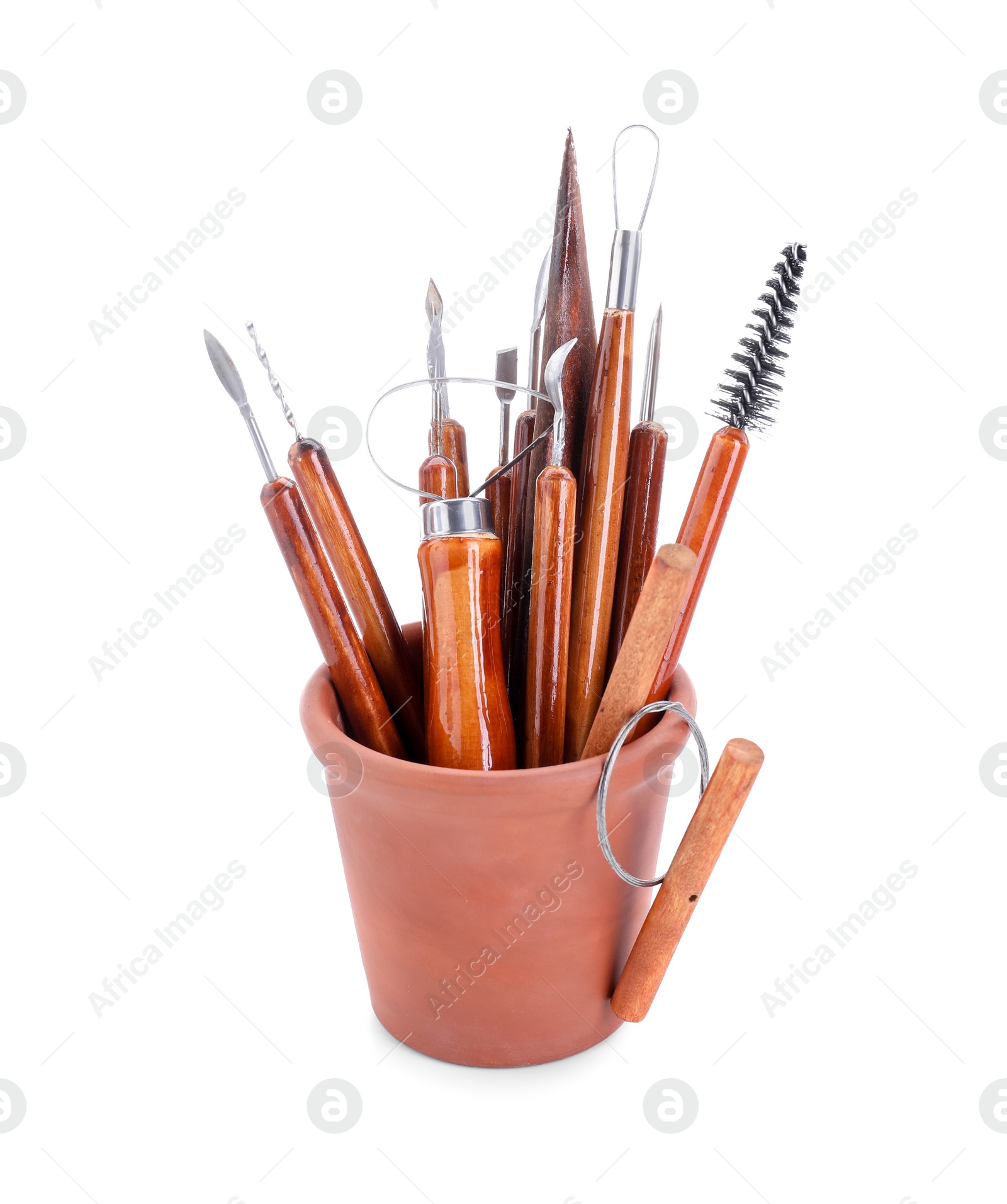 Photo of Set of different clay crafting tools isolated on white