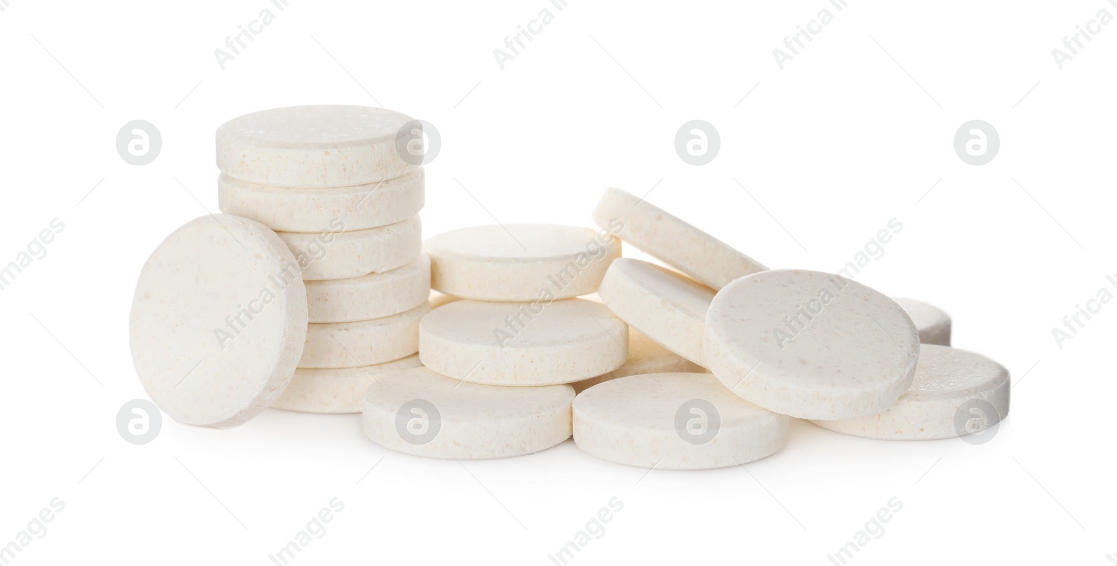 Photo of Pile of vitamin pills on white background