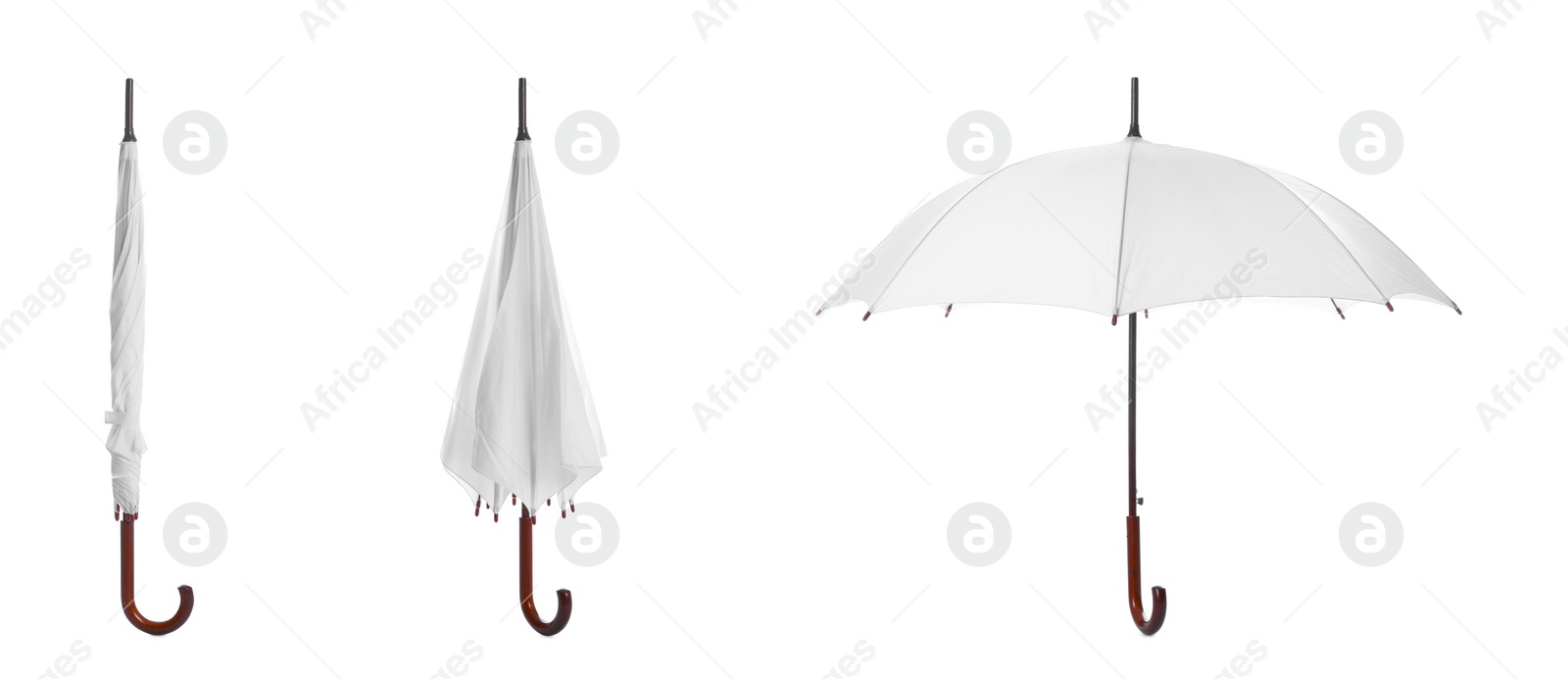 Image of Set with stylish umbrellas on white background. Banner design