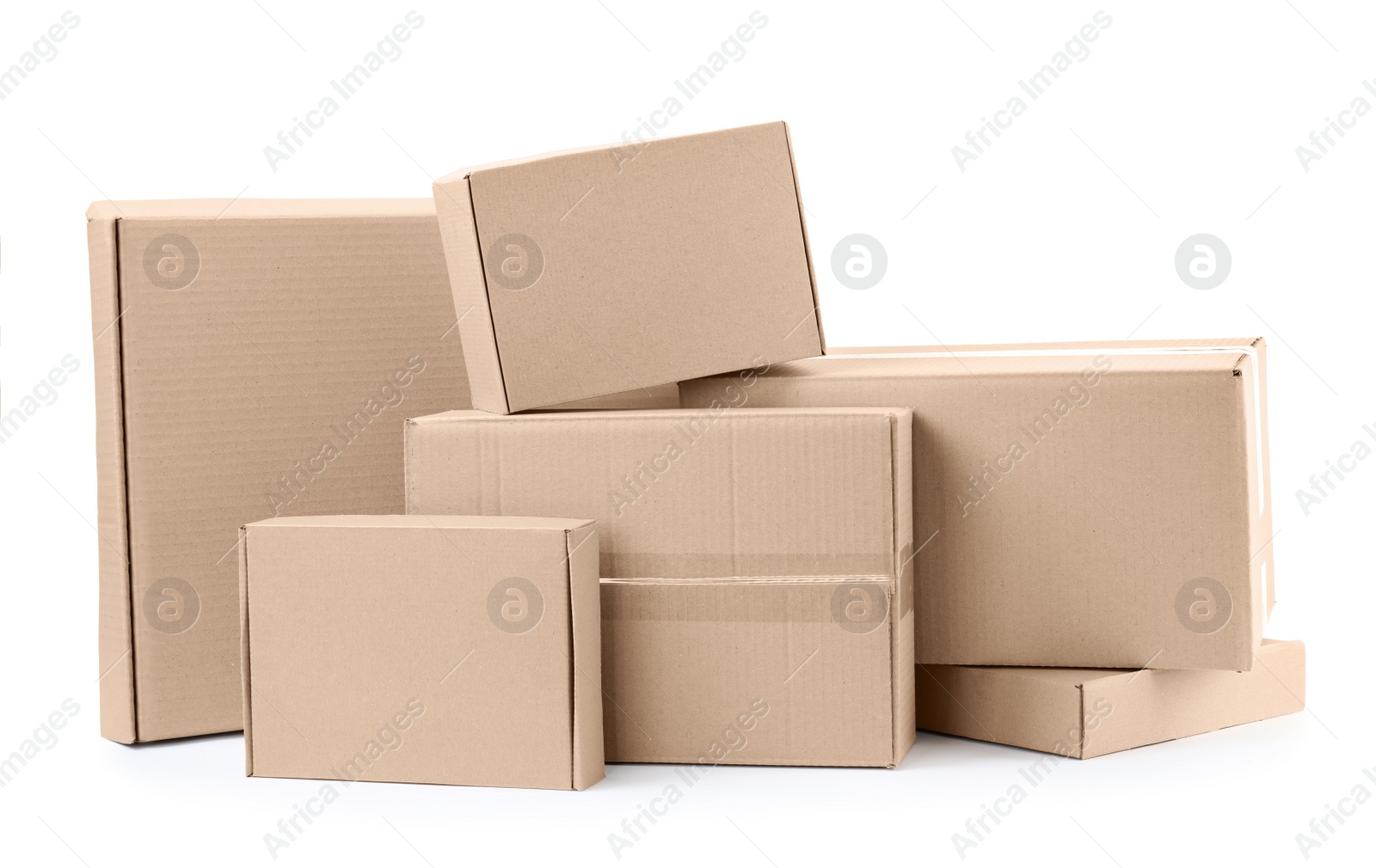 Photo of Pile of cardboard boxes on white background