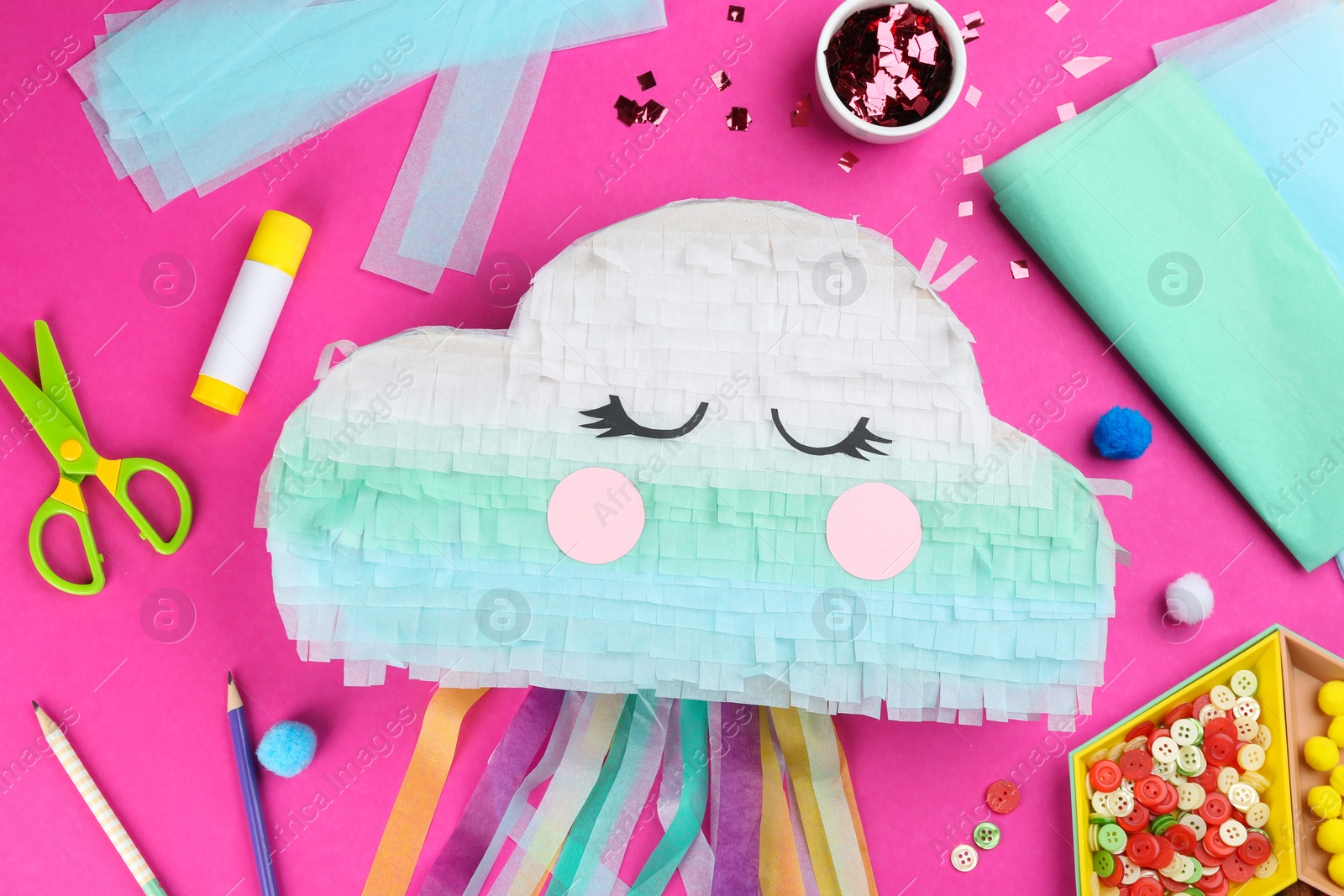 Photo of Flat lay composition with cardboard cloud on pink background. Pinata diy