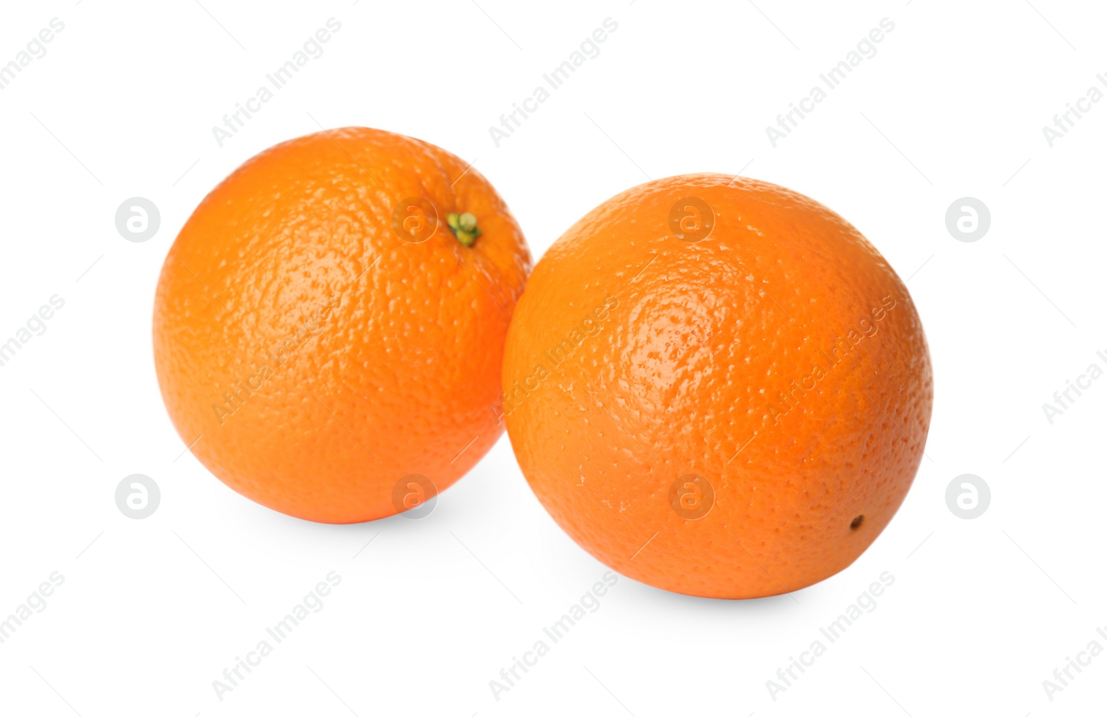 Photo of Delicious fresh ripe oranges on white background