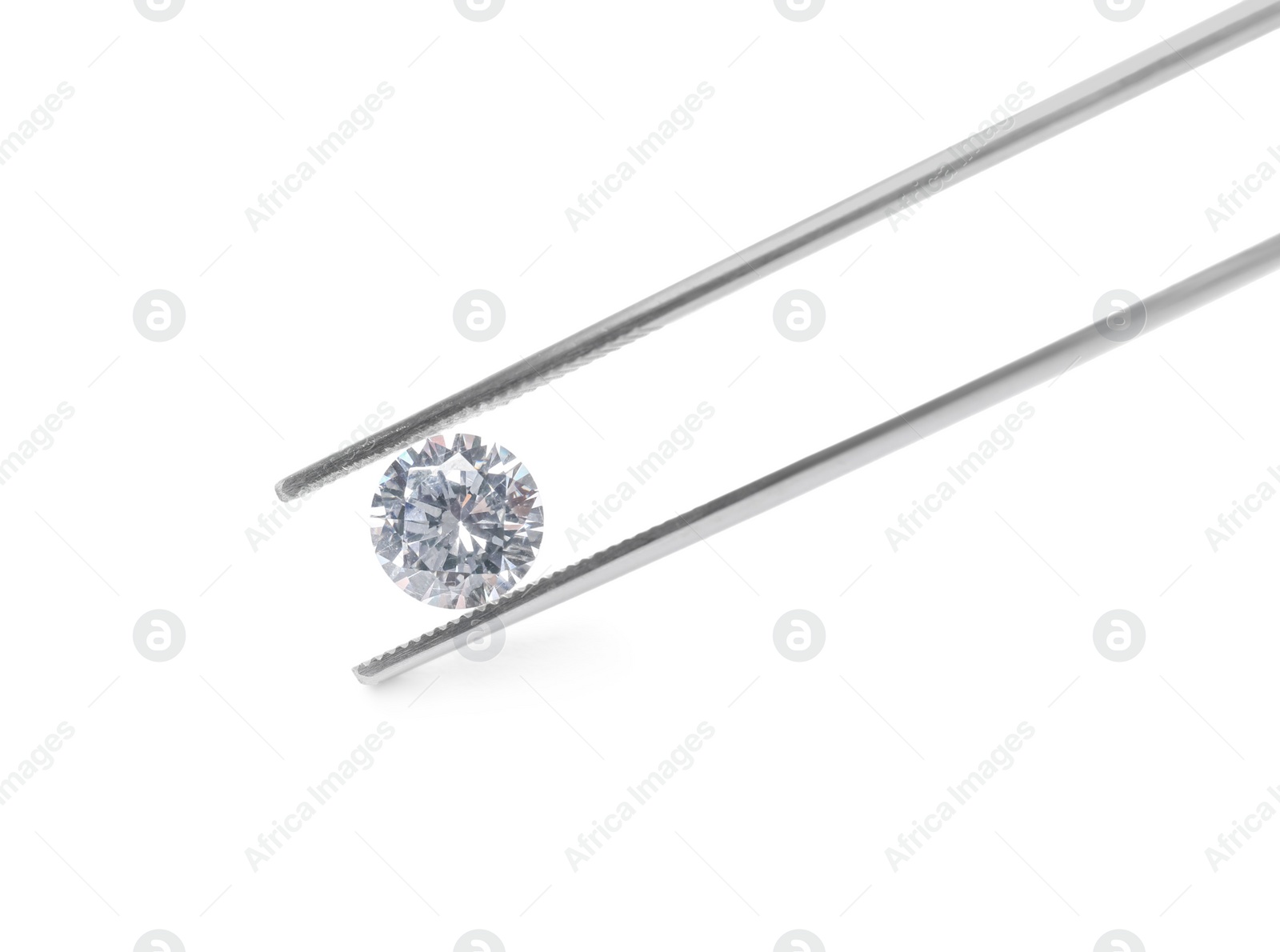 Photo of Tweezers with beautiful shiny diamond isolated on white