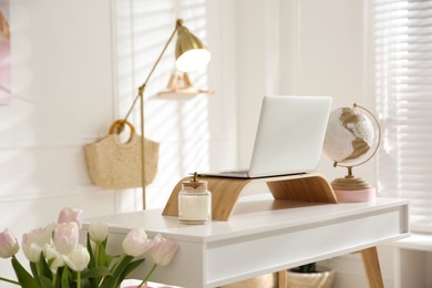 Photo of Stylish home office interior with comfortable workplace
