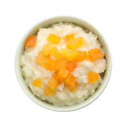 Photo of Delicious rice pudding with dried apricots isolated on white, top view