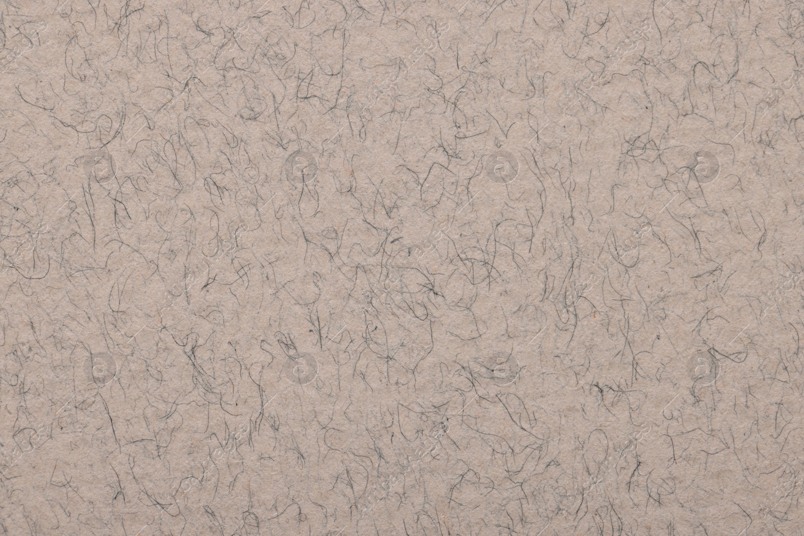 Photo of Texture of light grey paper sheet as background, top view