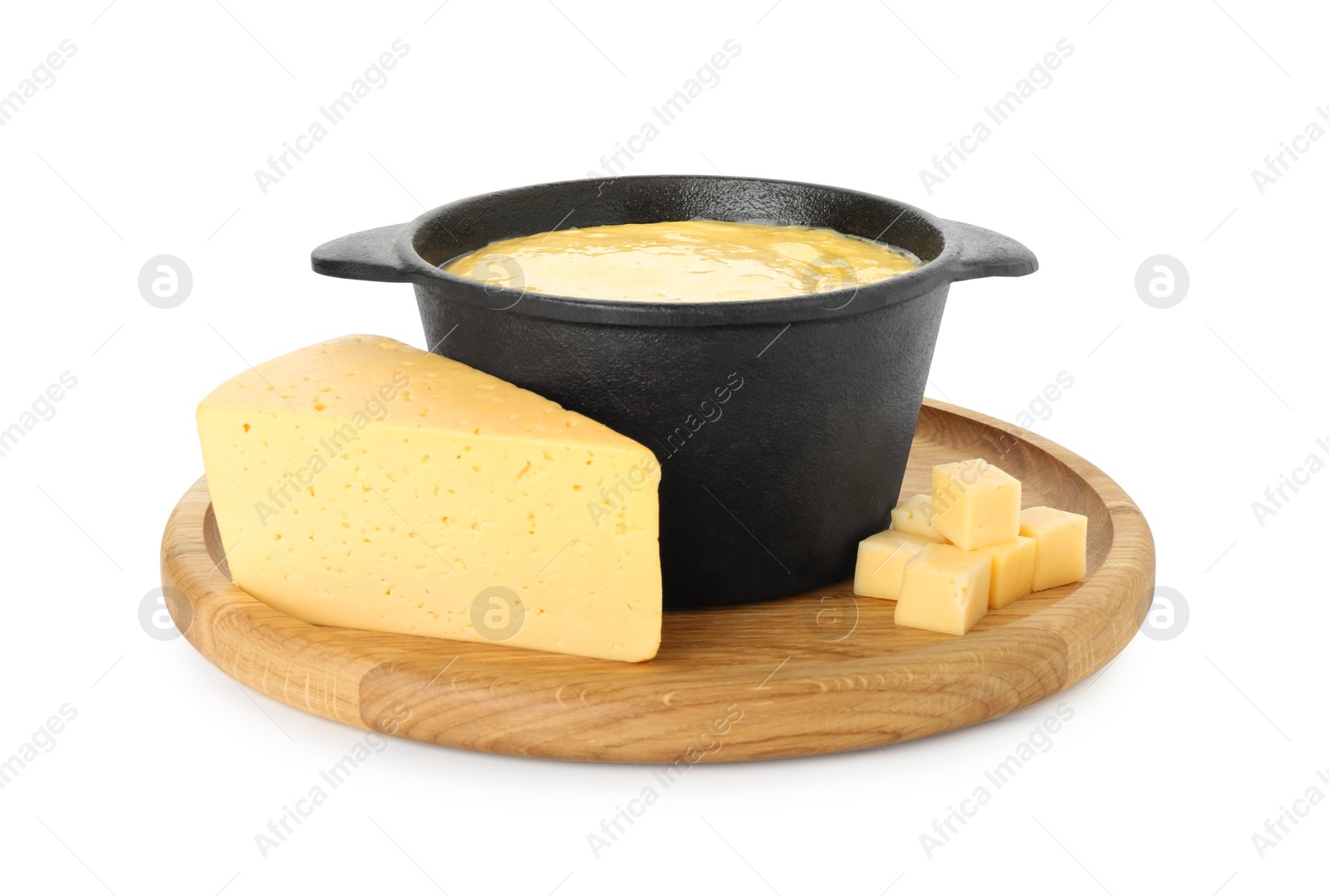 Photo of Fondue with tasty melted cheese and pieces isolated on white