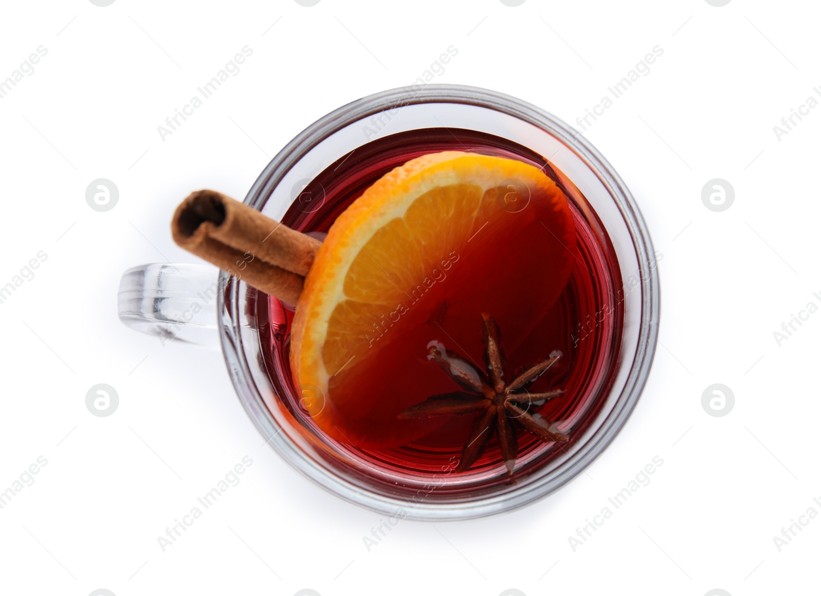 Photo of Glass cup of mulled wine isolated on white, top view