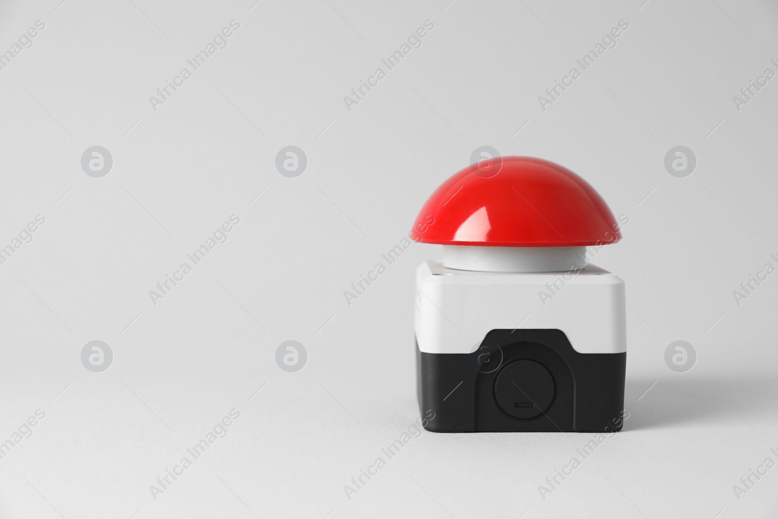 Photo of Red button of nuclear weapon on white background, space for text. War concept