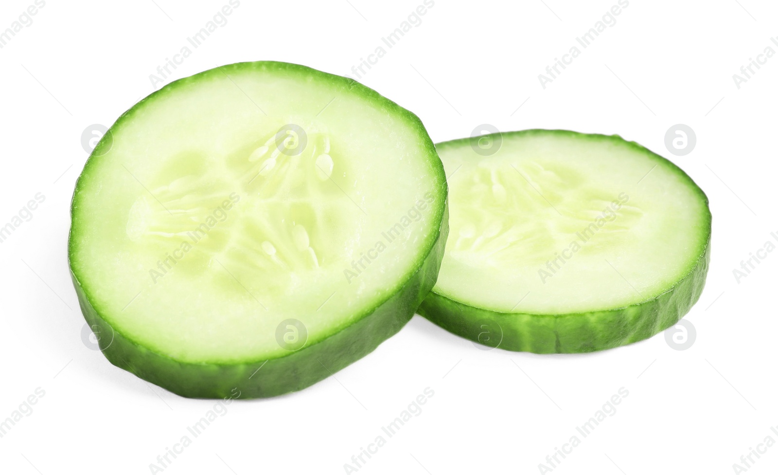 Photo of Slices of fresh cucumber isolated on white