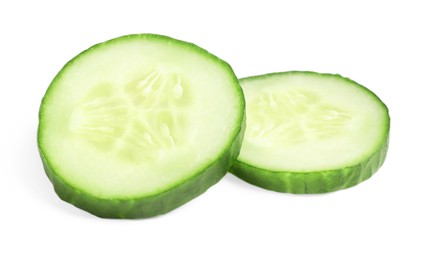 Photo of Slices of fresh cucumber isolated on white