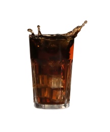 Photo of Cola splashing out of glass on light background